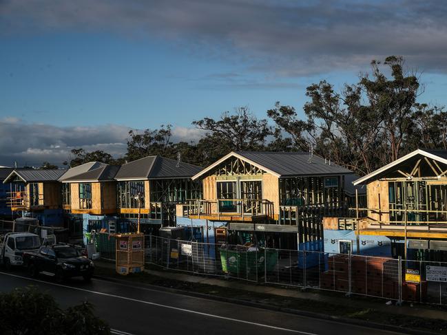 LAKE MACQUARIE, AUSTRALIA - MAY 08: New housing is shown under construction at Cameron Park on May 08, 2024 in Lake Macquarie, Australia. Australia's Labor government is grappling with a slowing economy, weaker commodity prices, soaring housing costs and a softening labor market as it prepares to unveil its federal budget on May 14. To counter these headwinds, the budget is expected to feature smaller revenue upgrades compared to recent years, while outlining the government's interventionist policies aimed at boosting domestic manufacturing and the transition to green energy. Critics warn that such industrial policies risk fueling inflation and diverting resources from more productive sectors of the economy. (Photo by Roni Bintang/Getty Images)