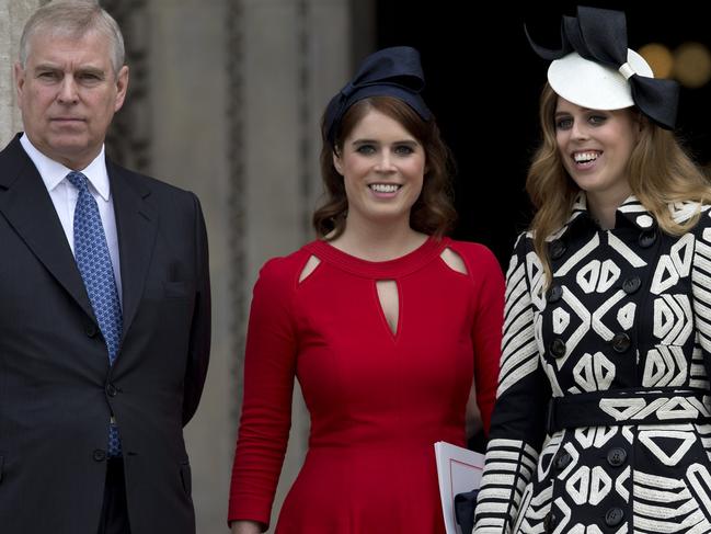 Britain's Prince Andrew (L), Britain's Princess Eugenie of York (2nd L), Britain's Princess Beatrice of York (R) leave after attending a national service of thanksgiving for the 90th birthday of Britain's Queen Elizabeth II at St Paul's Cathedral in London on June 10, 2016, which is also the Duke of Edinburgh's 95th birthday.  Britain started a weekend of events to celebrate the Queen's 90th birthday. The Queen and the Duke of Edinburgh along with other members of the royal family will attend a national service of thanksgiving at St Paul's Cathedral on June 10, which is also the Duke of Edinburgh's 95th birthday. / AFP PHOTO / JUSTIN TALLIS