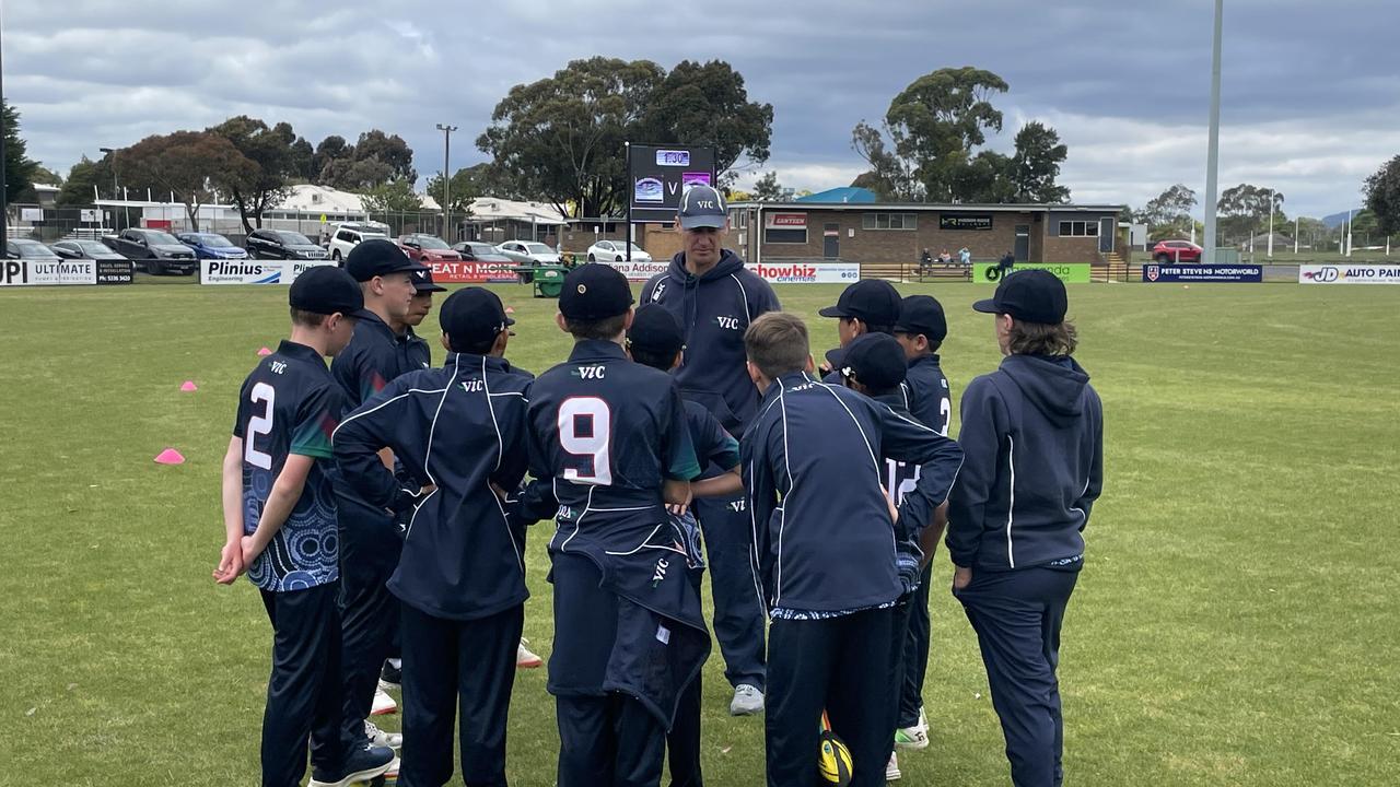 The Victoria Blue team in a huddle before playing their final group game. Picture: Shane Jones.