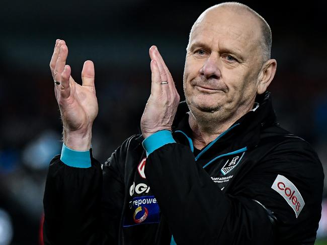 ADELAIDE, AUSTRALIA - MAY 19:   Ken Hinkley, Senior Coach of the Power thanks the fans as leaves the ground after   the round 10 AFL match between Yartapuulti (the Port Adelaide Power) and Hawthorn Hawks at Adelaide Oval, on May 19, 2024, in Adelaide, Australia. (Photo by Mark Brake/Getty Images)