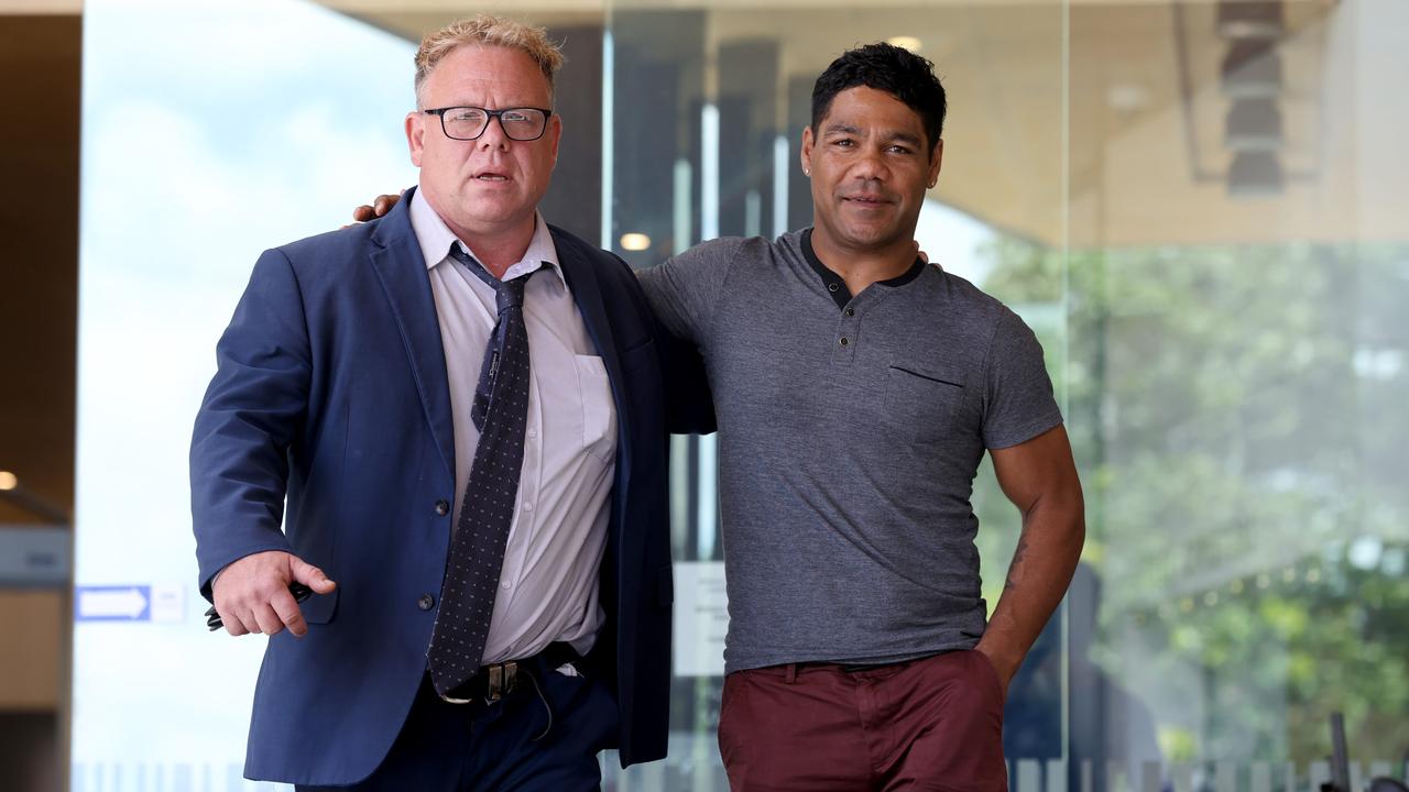 Former footballer Chris Sandow pictured with his lawyer Paddy O’Donnell outside Ipswich Courthouse. Picture: David Clark