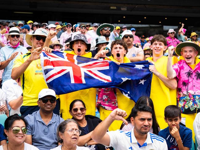 Aussie fans celebrate a wicket at the SCG on Day 1 of the 5th test. Picture: Tom Parrish