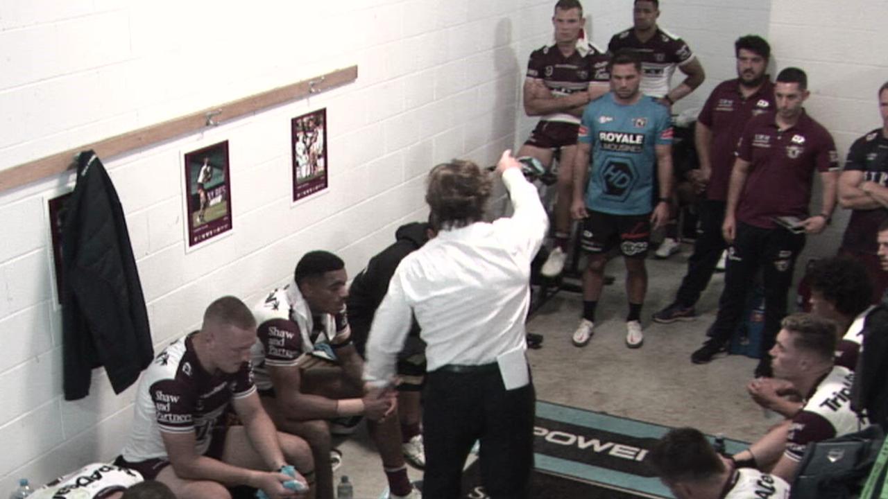 Des Hasler sprays his Sea Eagles players at half time.