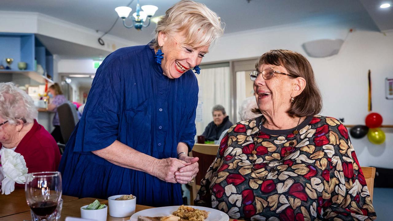 Maggie Beer serves lunch to resident Fay Reese at the Barossa Village Residency last year. Picture: Tom Huntley