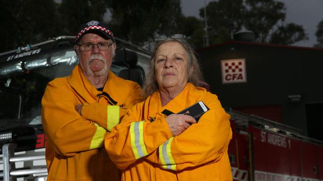 St Andrews CFA volunteers Helen Kenney and Terry Melbourne say poor phone reception frequently causes them problems when responding to calls for help. Picture: George Salpigtidis