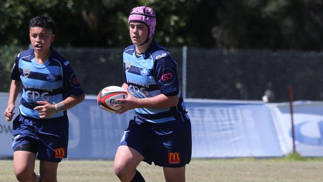 Action galleries of the junior rugby union grand finals, match played at Surfers Paradise Home Ground. Helensvale Hogs Vs Surfers Paradise Dolphins under 13s division.Picture Mike Batterham