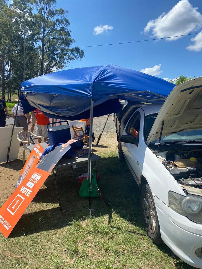 NEAR MISS: A driver has collided with a parked ute in Baree, sending it hurdling into a gazebo manned by election workers.