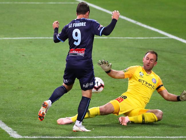 Adam Le Fondre of Sydney FC chips Eugene Galekovic of Melbourne City to score in the second half during the Round 3 A-League match between Melbourne City and Sydney FC at AAMI Park in Melbourne, Friday, November 2, 2018. (AAP Image/George Salpigtidis) NO ARCHIVING, EDITORIAL USE ONLY