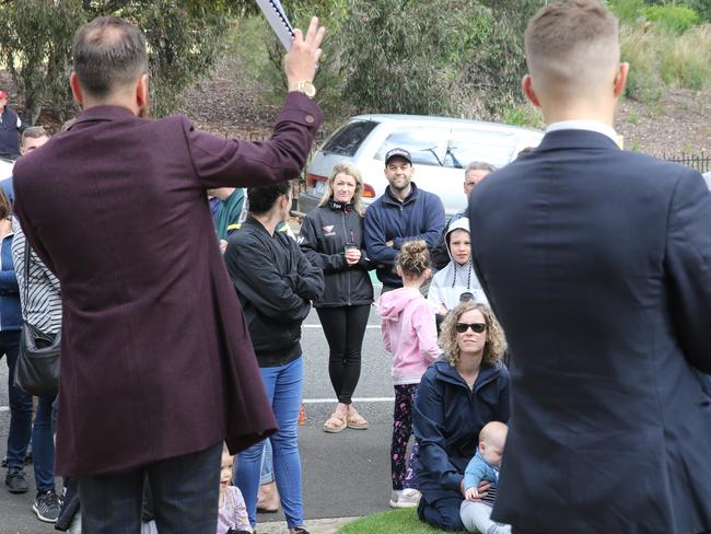 Unsuccessful bidders- couple  in centre of frame. Kieron Hunter at the auction of 59 Belle Vue Ave, Highton. Picture: Peter Ristevski