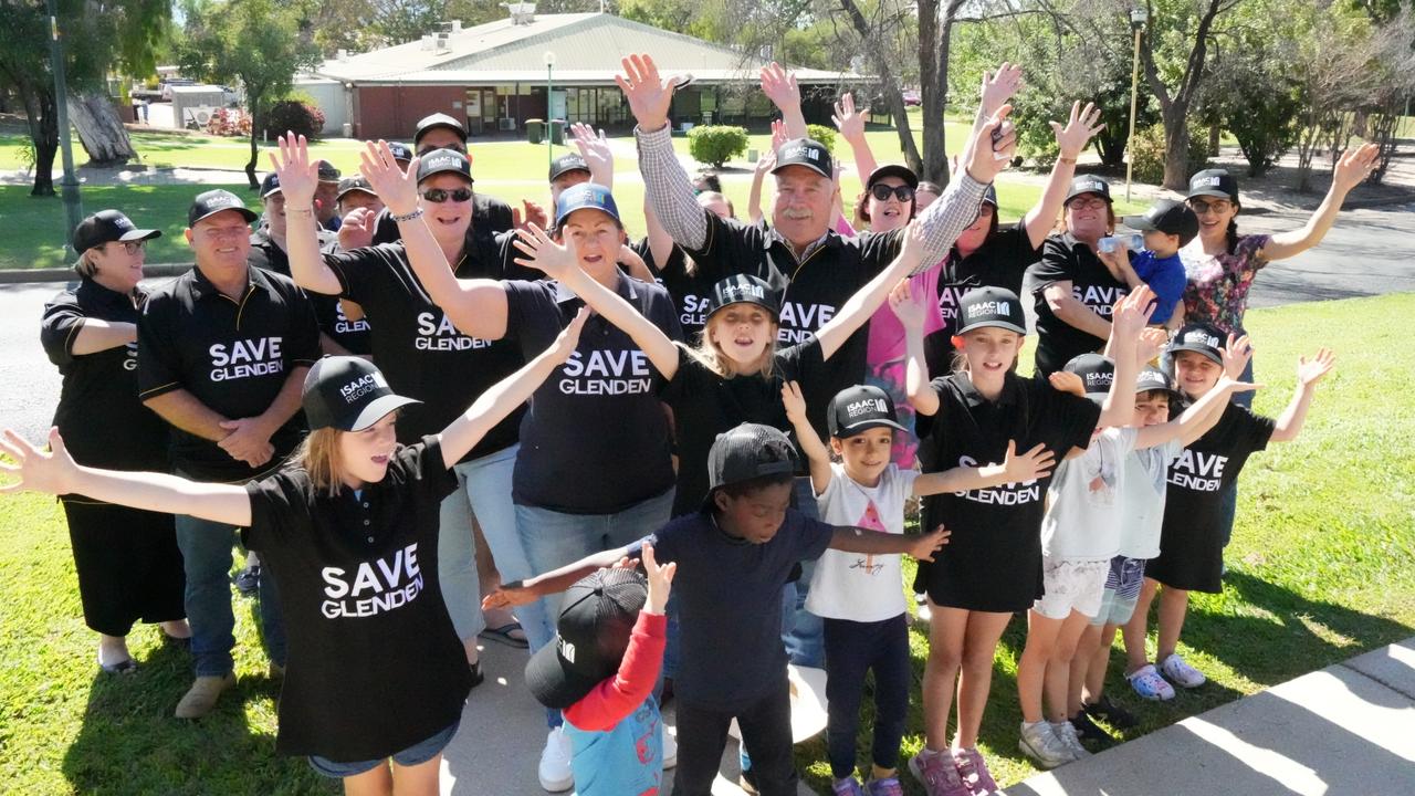 Isaac Mayor Anne Baker (centre) stands with Glenden residents as part of the council’s ‘Save Glenden’ campaign. Picture: Contributed