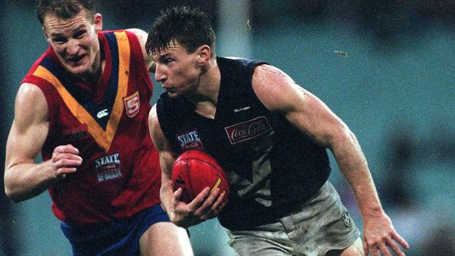 Brent Harvey in action during the AFL’s last State of Origin match in 1999.