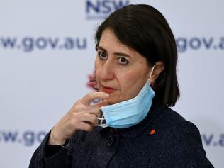 SYDNEY, AUSTRALIA - NewsWire Photos, AUGUST, 10, 2021: NSW Premier Gladys Berejiklian removes her face mask to speak to the media during a COVID-19 press conference in Sydney. New South Wales has recorded 356 new locally transmitted coronavirus cases overnight. Picture: NCA NewsWire/Bianca De Marchi