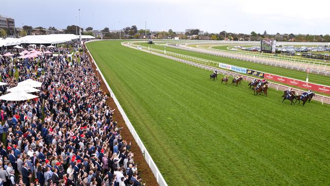 Gamay and Vegas Jewel fight out the finish in front of a big Caulfield crowd. Pic: AAP