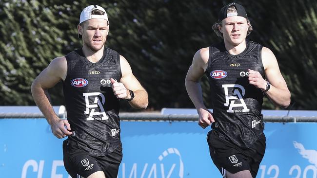 Robbie Gray was back running on Friday after breaking a toe in the club gym, and completed sprints with Xavier Duursma. Picture: Sarah Reed