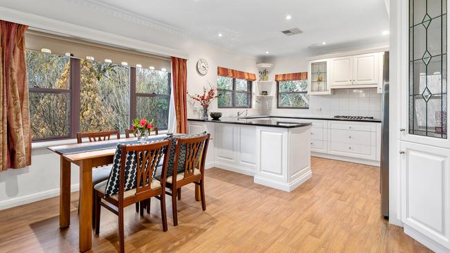 Open-plan kitchen and dining area.