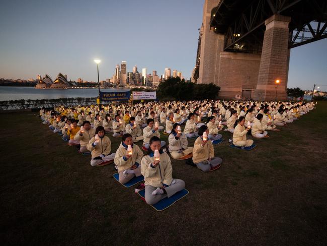 Perched underneath the Harbour Bridge is a popular meeting place and location for outdoor events, such as this mass meditation.