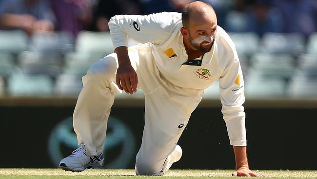 Nathan Lyon up close with his least successful surface, the WACA pitch