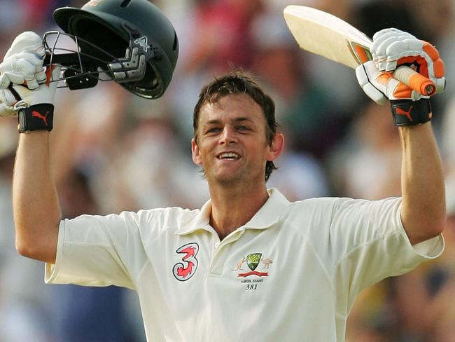 ##FEE APPLIES##  Adam Gilchrist celebrates reaching his century during day three of the third Ashes Test Match between Aust and England at the WACA on Dec 16, 2006.  (PicEzra./Shaw /Getty /Images) sport cricket action holding bat and helmet aloft