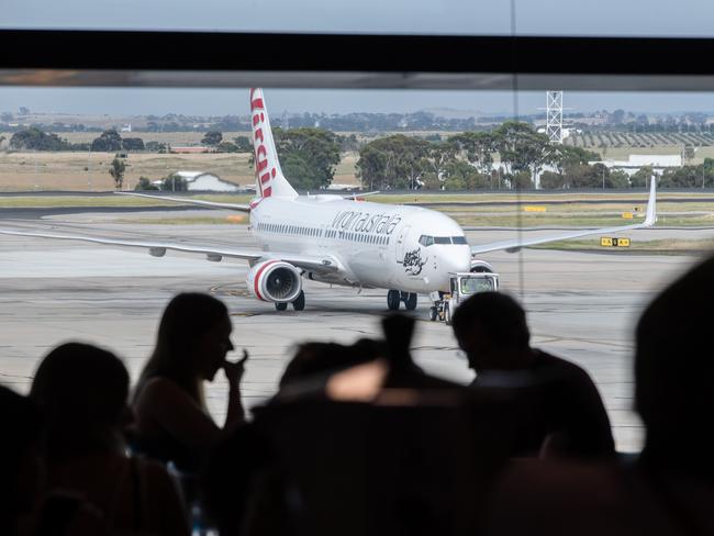 Crowds and cafes at terminal 4 Melbourne Airport. Picture: Jason Edwards