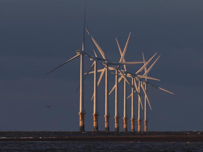 LIVERPOOL, ENGLAND - DECEMBER 07: Wind turbines generate electricity at Burno Bank Off Shore Wind Farm on December 07, 2022 in Liverpool, England. UK Prime minister Rishi Sunak has reversed his position on new onshore wind farms as the government said it will consult on proposals to allow further developments. (Photo by Nathan Stirk/Getty Images)