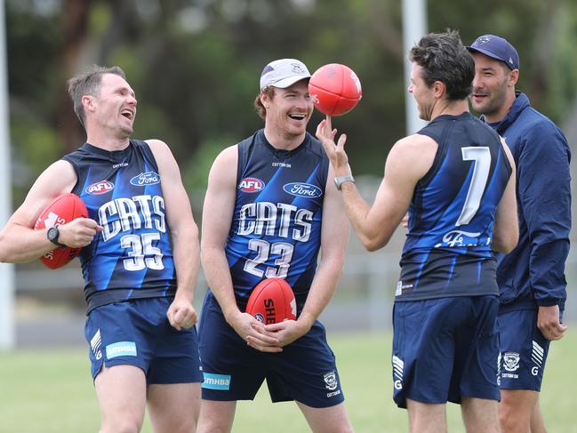 Patrick Dangerfield, Gary Rohan and Isaac Smith share a joke with Shaun Grigg. Picture: Alan Barber