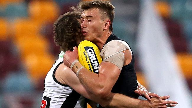 Mayne was hit flush as he attempted to tackle Carlton hard man Patrick Cripps. Picture: AFL Photos/Getty Images