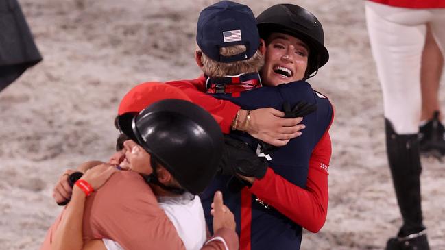 TOKYO, JAPAN - AUGUST 07: Jessica Springsteen of Team United States celebrates winning silver in the Jumping Team Final at Equestrian Park on August 07, 2021 in Tokyo, Japan. (Photo by Julian Finney/Getty Images)