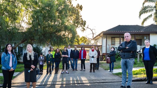 Dundas Valley residents Naji Bottos and Sigrid Rottmann with Parramatta councillors Pierre Esber and Michelle Garrard (far right), and neighbours who oppose a 19m unit block. Picture: Monique Harmer