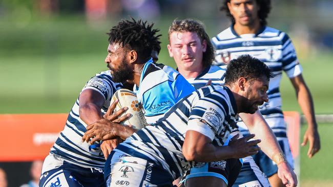 Samuel Pearson is tackled as Northern Sharks take on Darwin Brothers in Round 9 of the 2023 NRL NT season. Picture: Pema Tamang Pakhrin