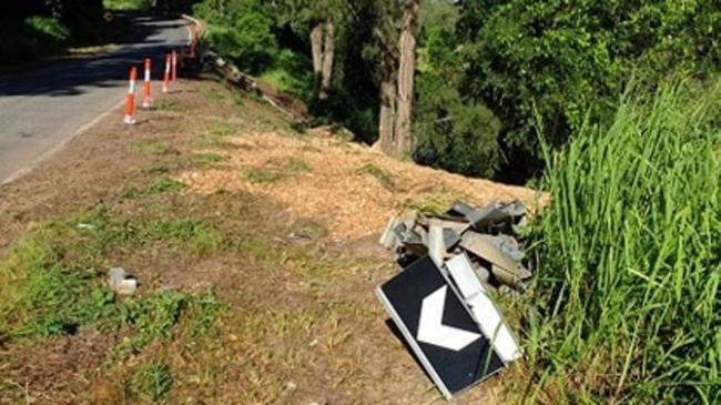 A truck driver was thought to be killed instantly when the semi-trailer he was driving rolled down an embankment on Yabba Creek Rd at Imbil yesterday afternoon. Photo: Frances Klein