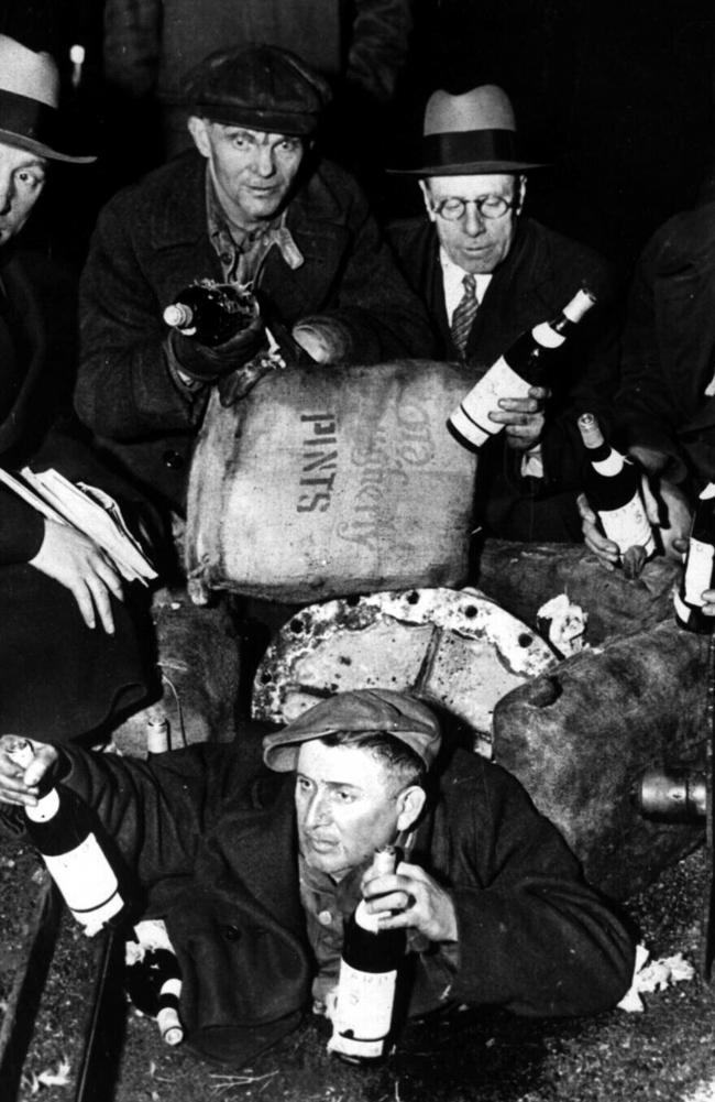 A pile of coal fails to hide $300,000 worth of liquor from prohibition agents in New York in 1932.