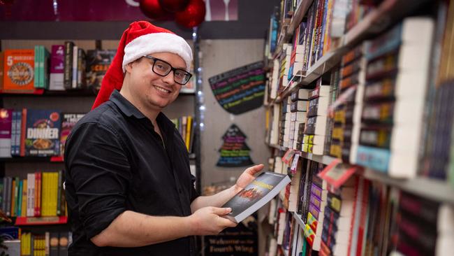 Sean Guy of The Bookshop has been serving at the store more than a decade and is proud of Smith Street's small-business community. Picture: Pema Tamang Pakhrin