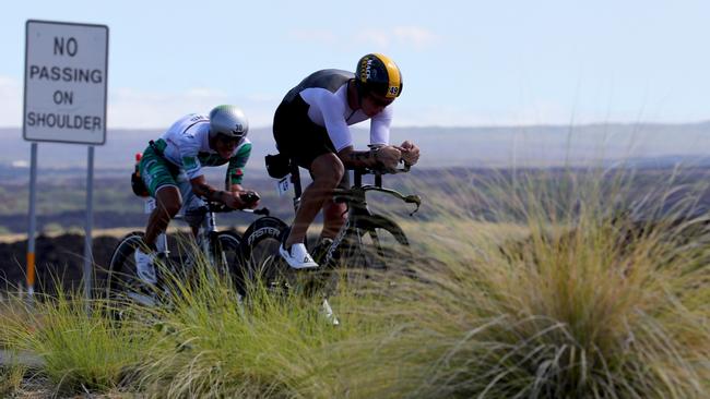 Cameron Wurf, right, during the cycle leg of last year’s Ironman World Championship in Hawaii. Picture: Tom Pennington/Getty