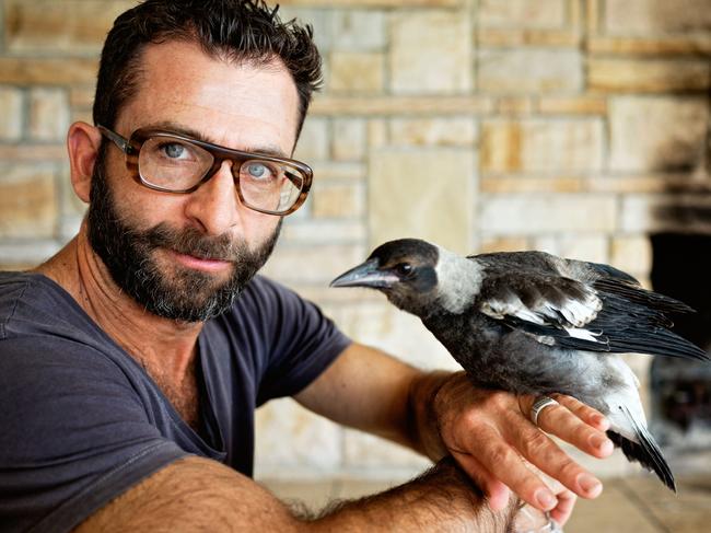 Cameron Bloom with the magpie named Penguin.