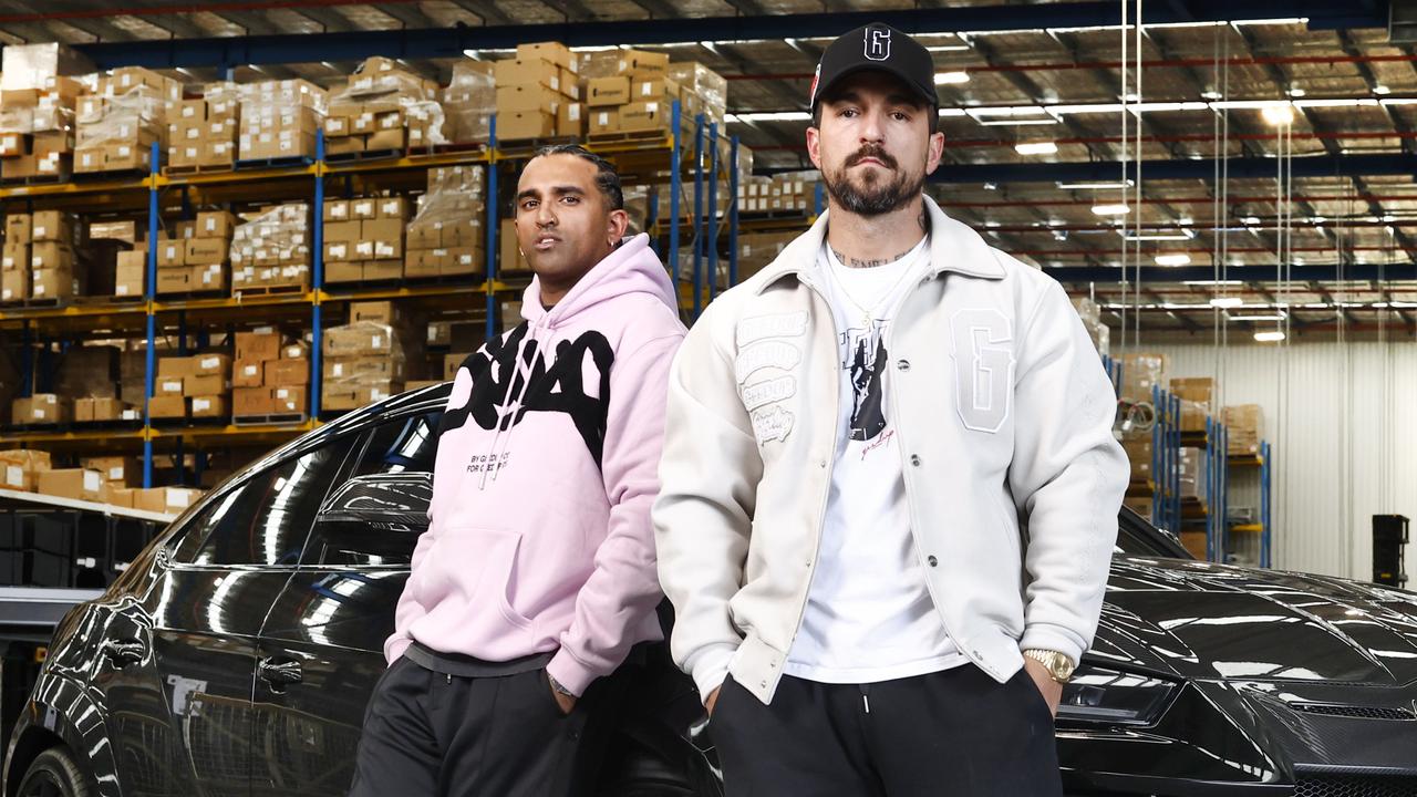 Geedup development manager ‘TK’ with Geedup clothing founder Jake Paco at their Sydney warehouse. Picture: Richard Dobson