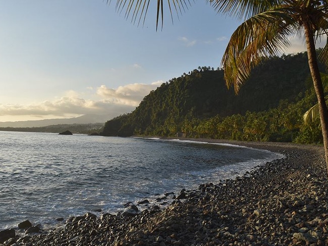 The rest of the island, halfway between the African coast and Madagascar, is covered with dark basalt from a volcano. Picture: Kevin Krajick/Earth Institute