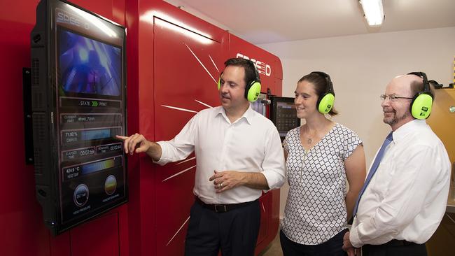 Defence Industry Minister Steven Ciobo, AMA director Rebecca Murray and CDU Vice-Chancellor Professor Simon Maddocks inspect the LightSPEE3D printer Picture: SUPPLIED 