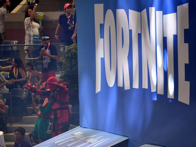 A Fortnite logo is  pictured during the final of the Solo competition at the 2019 Fortnite World Cup July 28, 2019 inside of Arthur Ashe Stadium, in New York City. (Photo by Johannes EISELE / AFP)