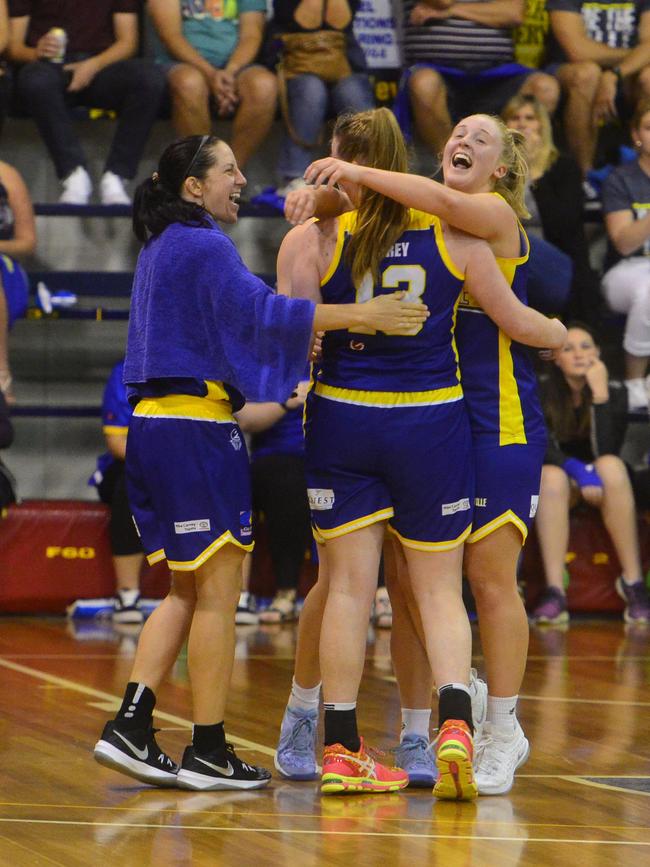 Queensland Basketball League quarter finals at Townsville Basketball Stadium. Townsville Flames against North Gold Coast Seahawks. Flames' players celebrate win. Picture: Evan Morgan