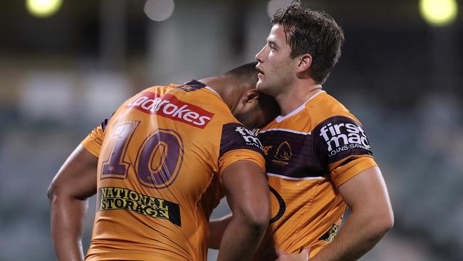 Payne Haas and Patrick Carrigan look dejected after losing to the Raiders. Picture: Matt King/Getty Images