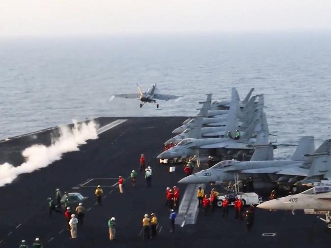 This image taken from video provided by the U. Navy shows an aircraft launching from the USS Harry S. Truman in the Red Sea before air strikes in Sanaa, Yemen in March. Picture: AP Photo