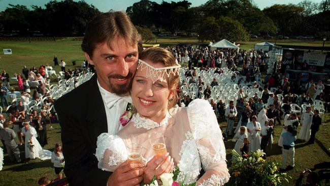 In 1997 a radio station hosted a mass wedding ceremony at New Farm Park. Pictured here is newlyweds Wayne and Sue Hanlon. Picture: Steve Pohlner