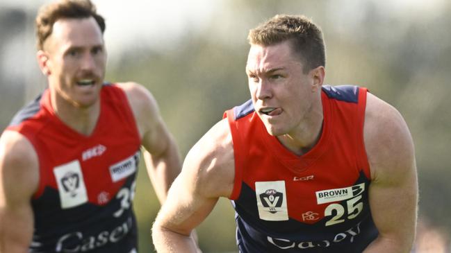 Tom McDonald gathers the ball during the VFL qualifying final between Casey Demons and Sydney Swans on Saturday.