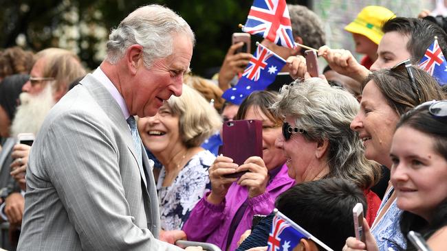 (FILES) Prince Charles is greeted by members of the public during a visit to Brisbane on April 4, 2018. King Charles III this week begins his first tour of Australia as monarch, reigniting debate about whether the country should sever ties with the British monarchy and become a republic. (Photo by DAN PELED / POOL / AFP)