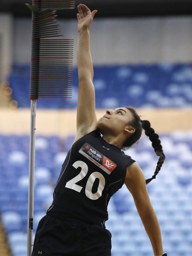 Alana Barba completes the running vertical jump test.