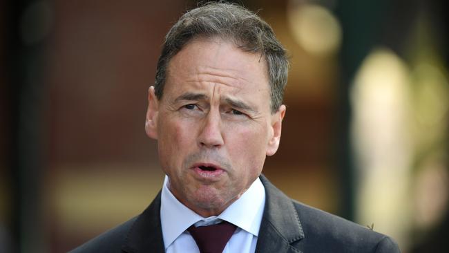 Health Minister Greg Hunt says the Oxford vaccine is still on schedule despite trials being halted. Picture: AAP/James Ross