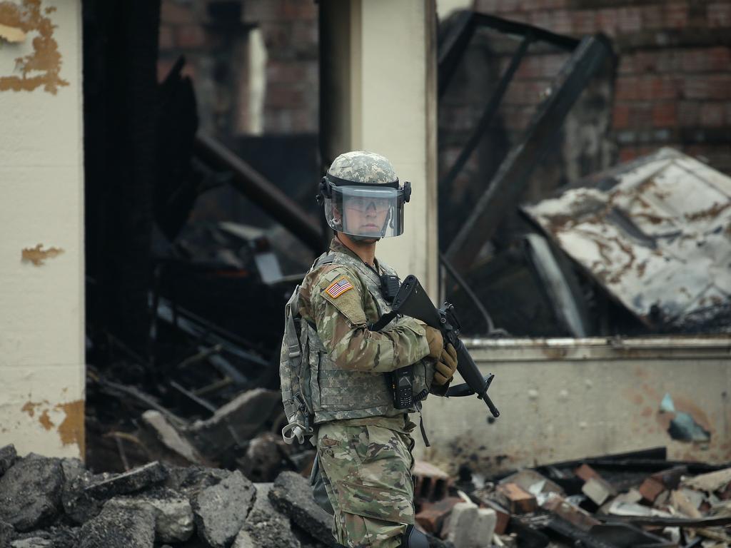 Daylight showed the extent of the damage after a police station was burned down in Minneapolis. Picture: Scott Olson/Getty Images/AFP.