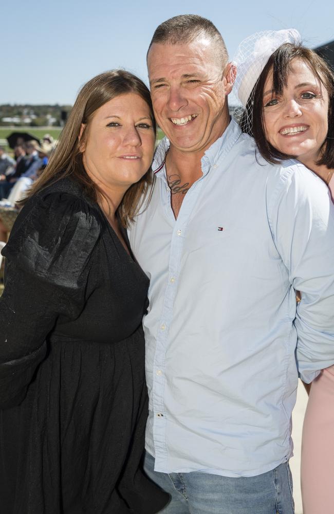 Jenna and Jason King get photobombed by friend Cynthia McDonald at Warwick Cup race day at Allman Park Racecourse, Saturday, October 14, 2023. Picture: Kevin Farmer