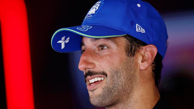 SPIELBERG, AUSTRIA - JUNE 30: 9th placed Daniel Ricciardo of Australia and Visa Cash App RB talks to the media in the Paddock after the F1 Grand Prix of Austria at Red Bull Ring on June 30, 2024 in Spielberg, Austria. (Photo by Chris Graythen/Getty Images)