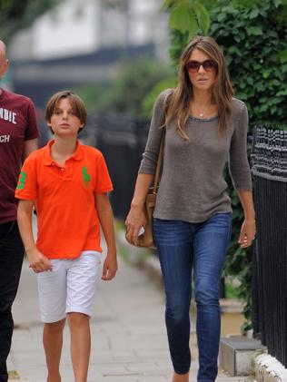 Liz Hurley and her son, Damian, leave her London home to go out for a meal. Photo: Splash